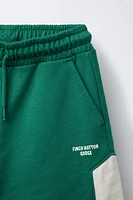 ENSEMBLE DE JOGGING T-SHIRT ET BERMUDA LISERÉS
