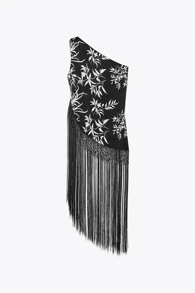 TOP ASYMÉTRIQUE BRODÉ À FRANGES