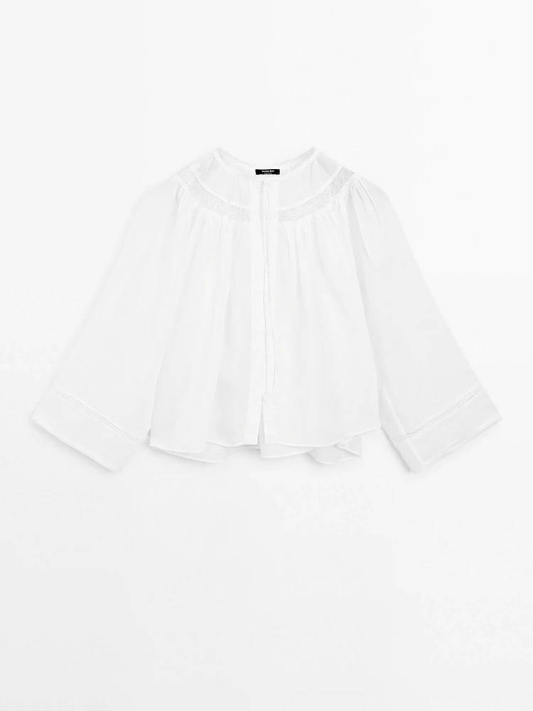 Blouse fluide à dentelle