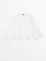 Blouse fluide à dentelle