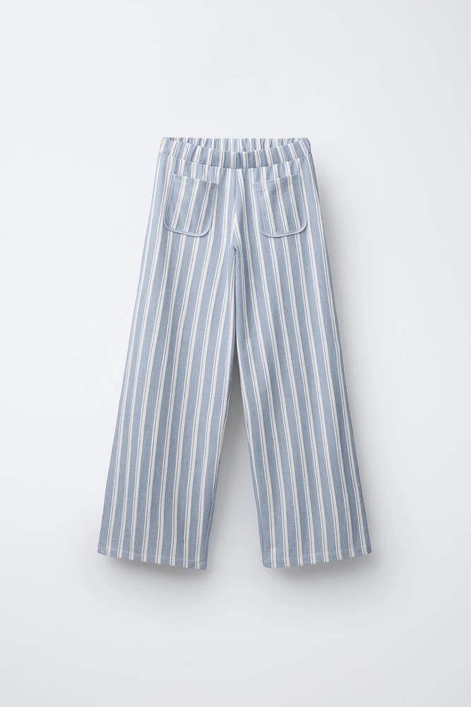 STRIPED PANTS WITH PIPED POCKETS