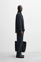 TEXTURED PLEATED PANTS