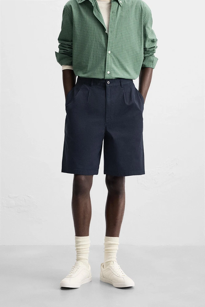 BERMUDA RELAXED FIT À PLIS