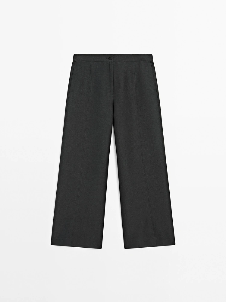 Flowing wide-leg trousers with seam details