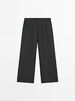 Flowing wide-leg trousers with seam details