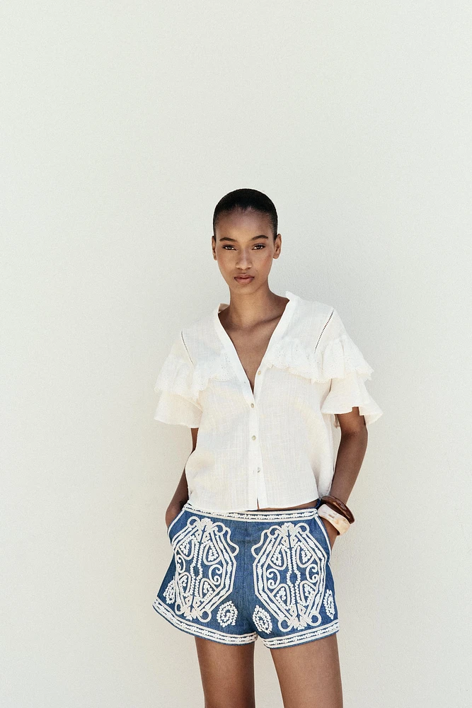 SHORT SLEEVE RUFFLE BLOUSE