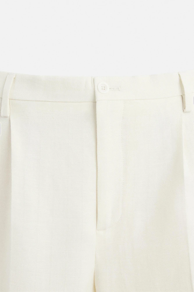 LIMITED EDITION HERRINGBONE LINEN-WOOL PANTS