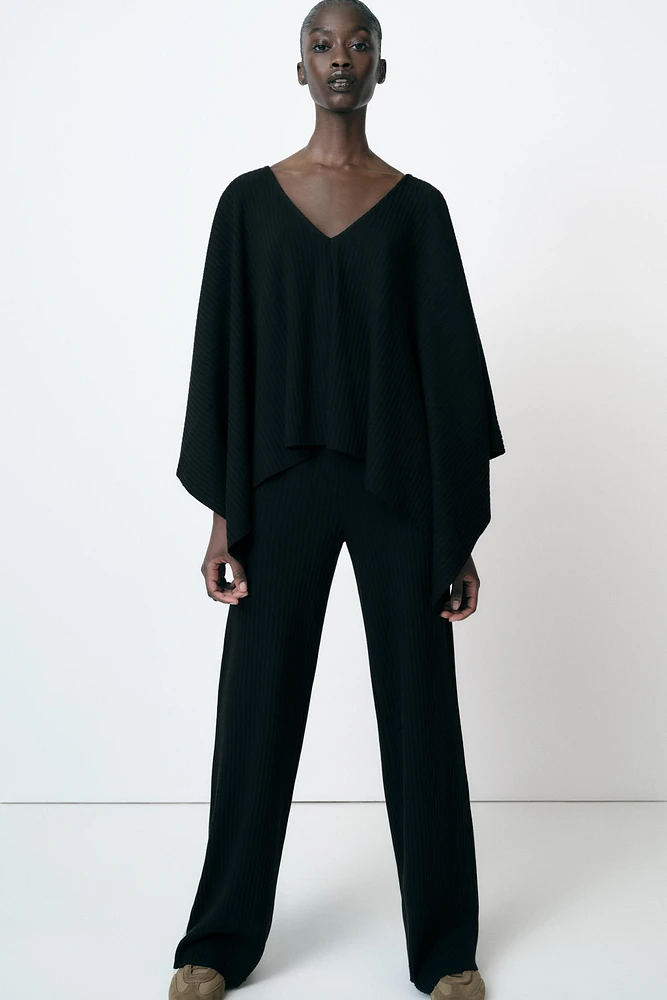 ASYMMETRIC RIBBED CAPE