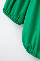 COMBINED ELASTICIZED TOP