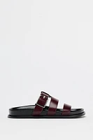 FLAT SANDALS WITH LEATHER STRAPS