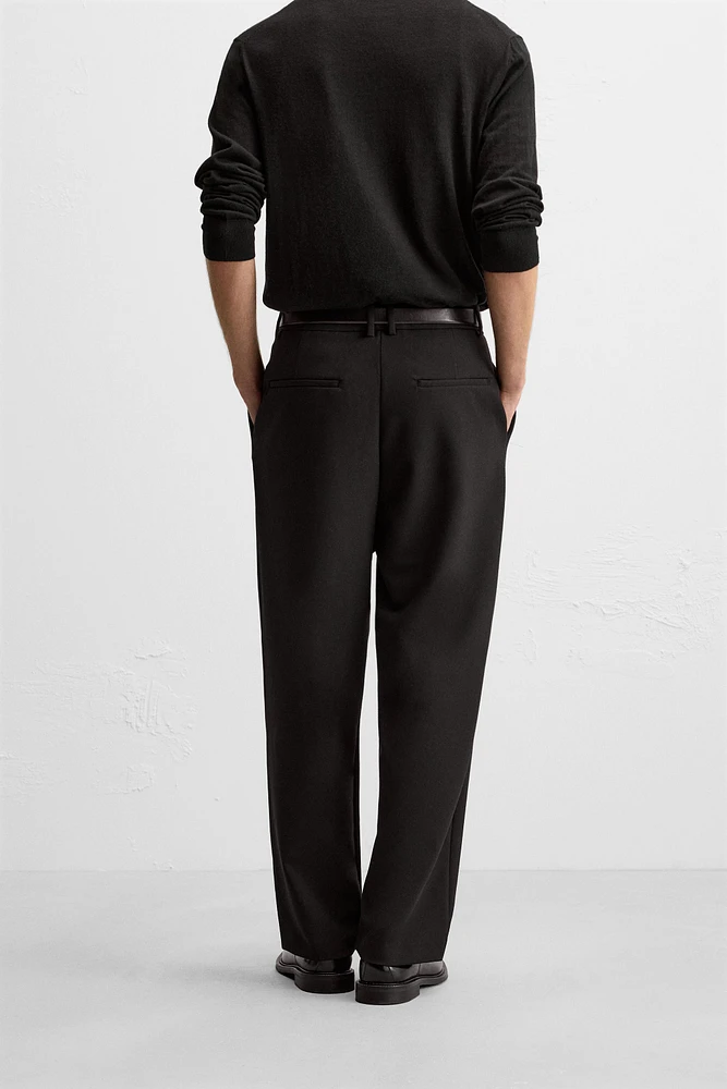 RELAXED FIT PLEATED PANTS