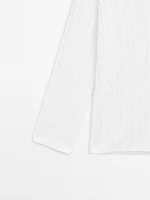 Pull coton en maille tressée ajourée
