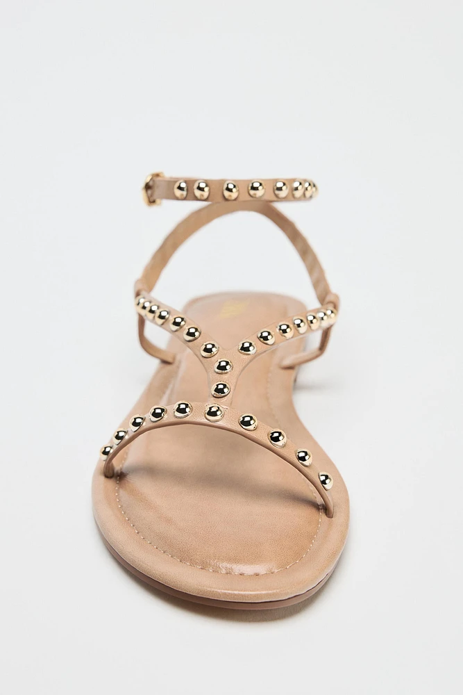 SANDALES À BRIDES ET VERROTERIES MÉTALLIQUES