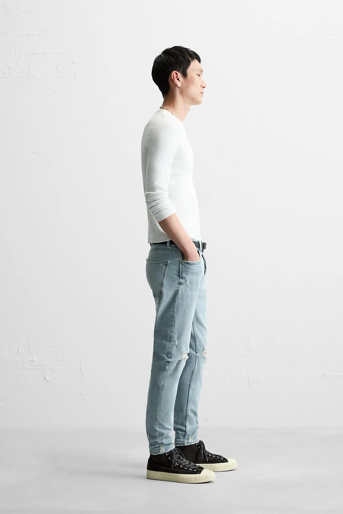 RIPPED SKINNY JEANS