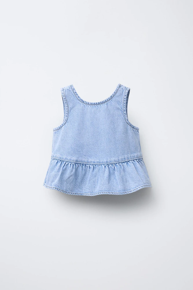 TOP EN DENIM À VOLANTS
