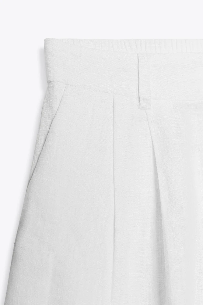 LINEN PLEATED BERMUDA SHORTS