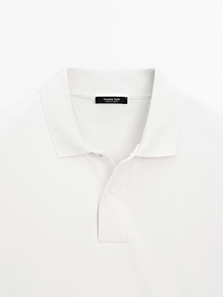 Cotton blend slim fit knit polo shirt