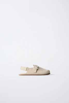 SABOTS EN CUIR
