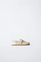 SABOTS EN CUIR