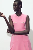 ROBE EN MAILLE À PLIS