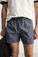 GEOMETRIC PRINT SHORT SWIMMING TRUNKS