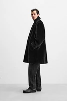 MANTEAU EN FAUSSE FOURRURE