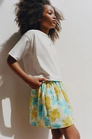 JUPE-SHORT BERMUDA À FLEURS EN LIN