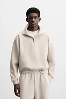 QUARTER ZIP TECHNICAL SWEATSHIRT