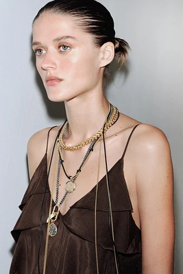 3-PACK OF MEDALLION AND HORN NECKLACES