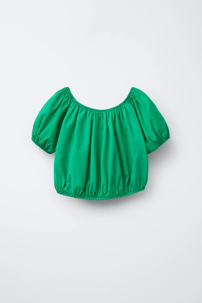 COMBINED ELASTICIZED TOP