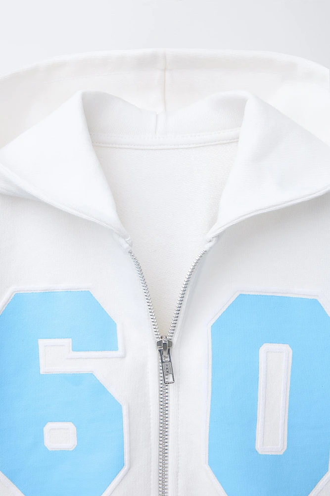 SWEAT COURT À CAPUCHE ZIP VARSITY