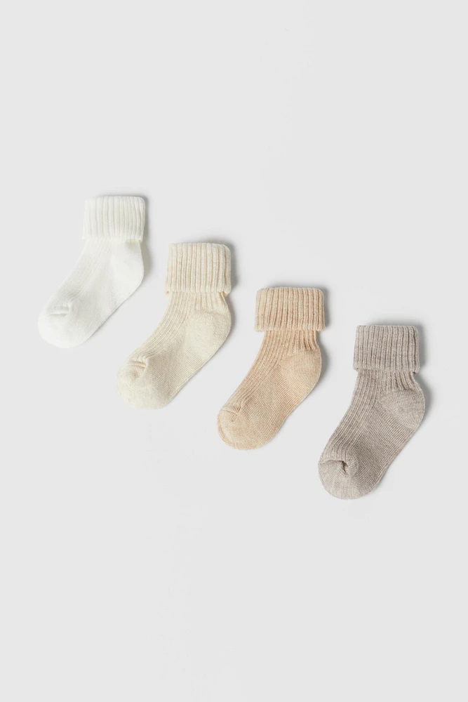 LOT DE QUATRE CHAUSSETTES COLORÉES