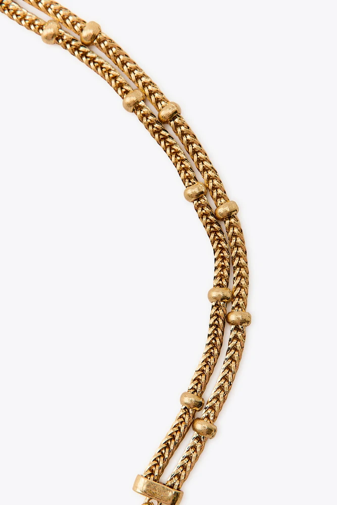 COLLIER EN MATIÈRES VARIÉES CHARMS PAPILLON