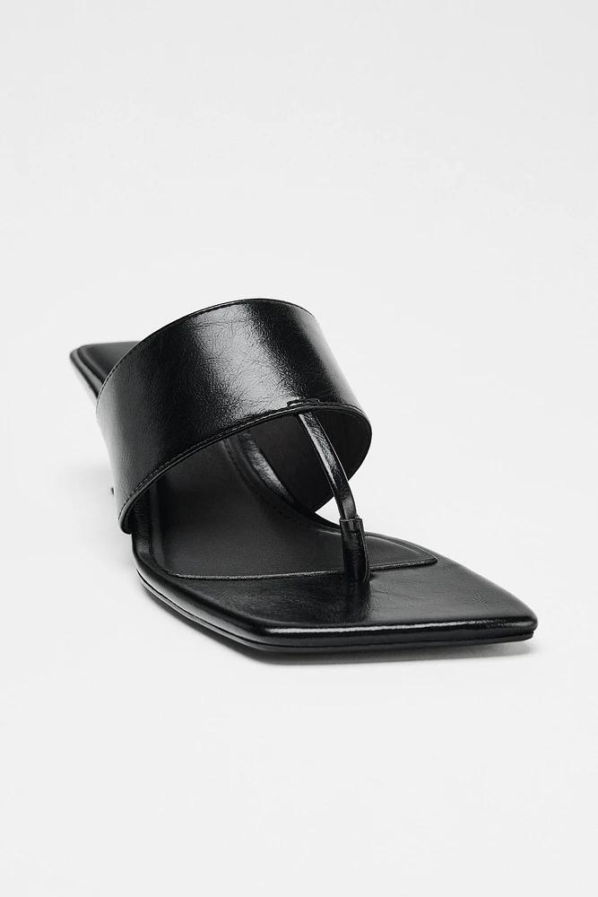 ASYMMETRIC WEDGE HEELS