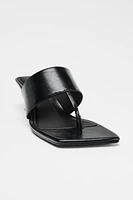 ASYMMETRIC WEDGE HEELS