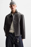 BLOUSON EN CUIR À POCHES