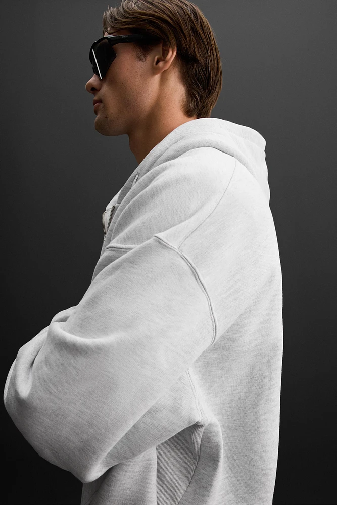 SWEAT À CAPUCHE ET ZIP
