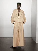 Pantalon palazzo à pinces
