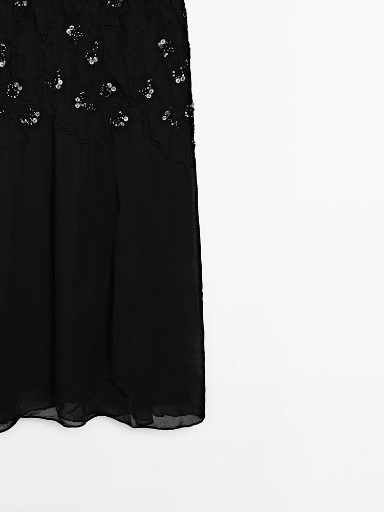 Long dress with beading