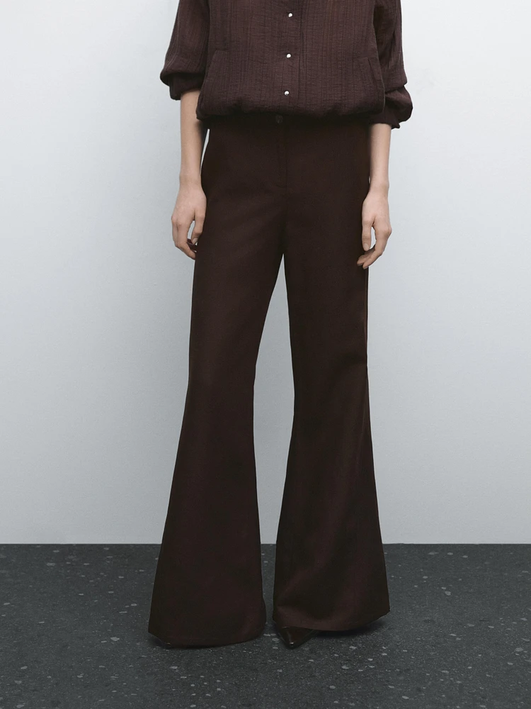 Flared trousers with seams