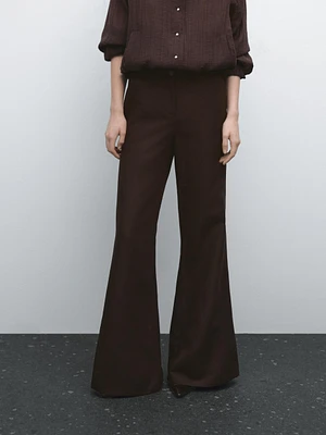 Flared trousers with seams