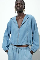 ADJUSTABLE HEM HOODED JACKET