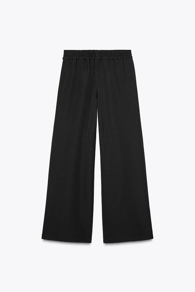 PANTALON LARGE AVEC BANDE LATÉRALE