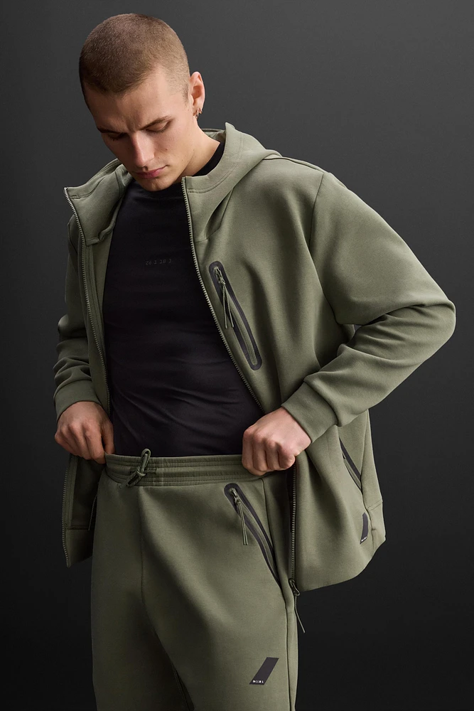 PANTALON DE JOGGING TECHNIQUE À ZIPS
