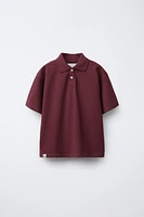 POLO BOXY FIT ÉTIQUETTE