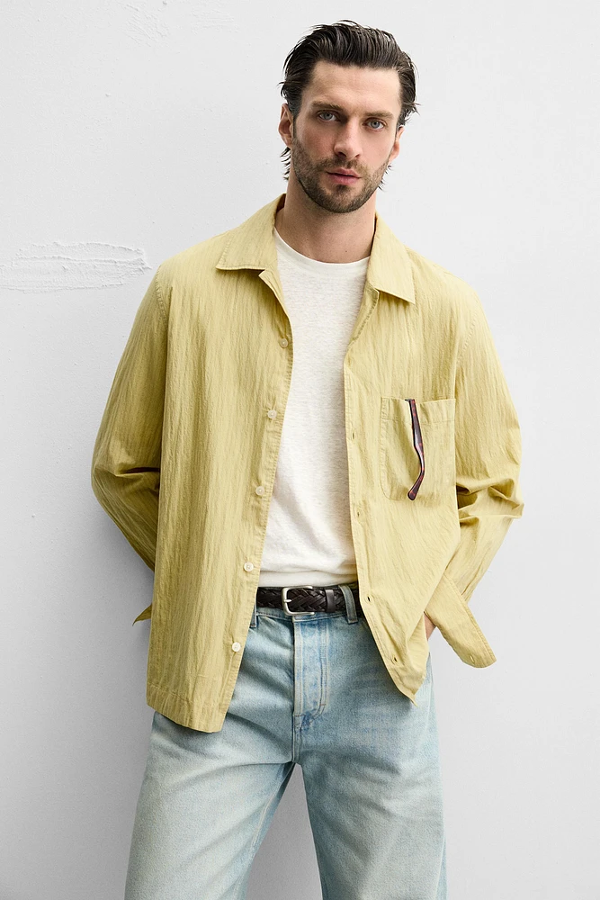 CONTRASTING STRIPED SHIRT