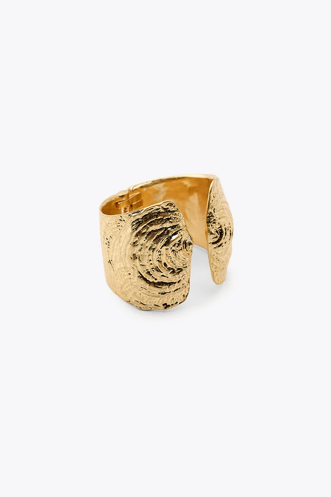 DOUBLE SHELL RIGID BRACELET