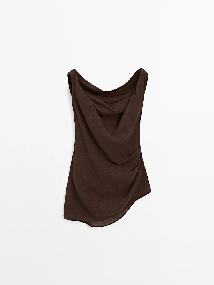 Top lin à encolure asymétrique