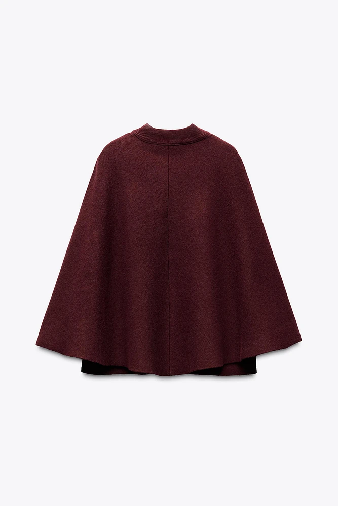 MANTEAU CAPE EN MAILLE
