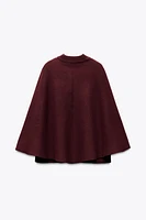 MANTEAU CAPE EN MAILLE